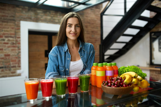 Diet Nutrition. Woman With Fresh Juice Smoothie In Kitchen