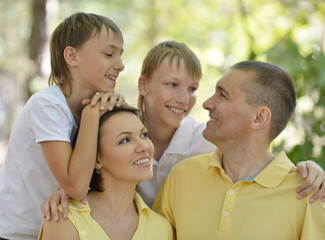 Family of four resting 