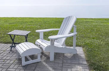 Fotobehang White Adirondack Chair by Lake Erie © chiyacat