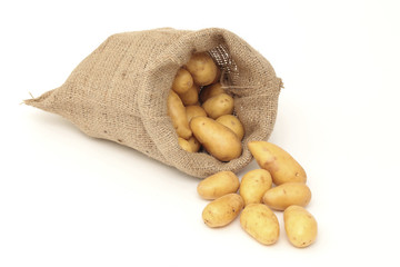 A jute bag filled with potatoes