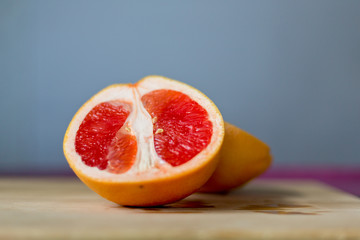 Grapefruit on wooden cutting Board