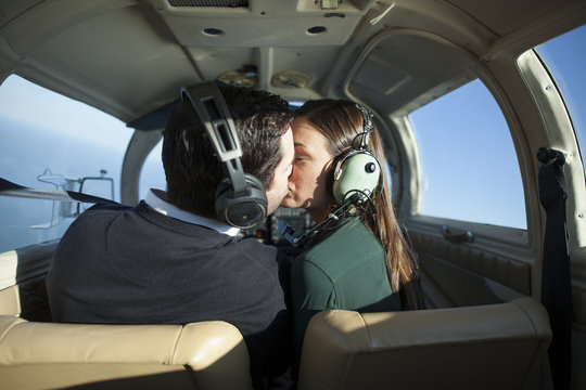 Young pilot and girlfriend