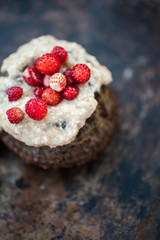 Mini chocolate bundt cake with cheese cream and strawberries