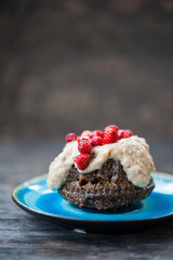 Mini chocolate bundt cake with cheese cream and strawberries