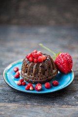 Mini chocolate bundt cake with red berries