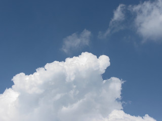Naklejka na ściany i meble Sky with giants cumulonimbus clouds and sun rays through