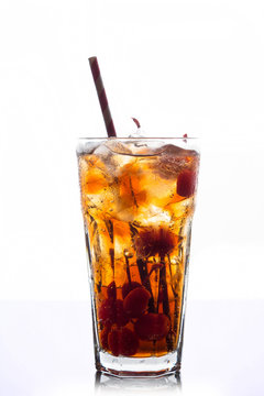 Refreshing cold cherry cola isolated on a white background