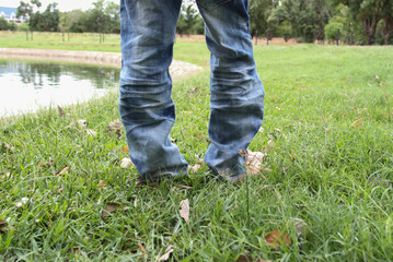 Foot child standing on the lawn