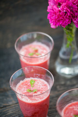 Watermelon juice on a wooden table