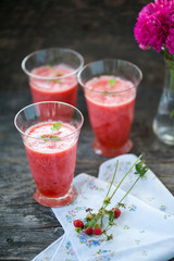 Watermelon juice on a wooden table