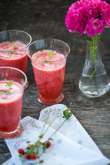 Watermelon juice on a wooden table