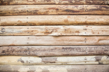 Naklejka premium light brown wood pile background