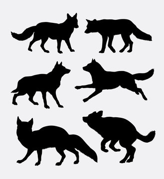 Wolf and fox activity silhouette. Good use for symbol, logo, web icon, mascot, game element, or any design you want.