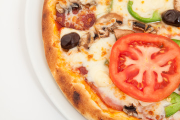 Close up of pizza margarita. Tomato, mushrooms, pepper, cheese