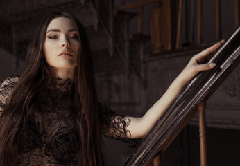 Beauty fashion woman portrait wearing black top with perfect smokey makeup 