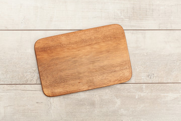 Background with cutting board on wooden table