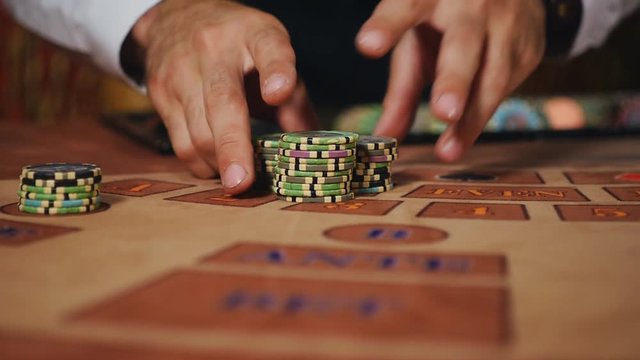 Luck smiled player. The dealer moves the player's winnings