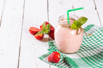 jar smoothies, yogurt and fresh strawberries