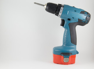 Cordless screwdriver with a Phillips on a white background