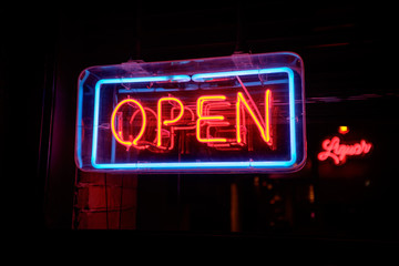 open sign welcomes customers into the restaurant