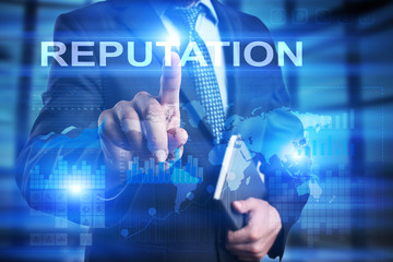 Businessman is pressing on the virtual screen and selecting Reputation.