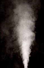 White vapor on the black background