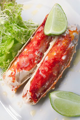 Top view of Red king crab meat served on white plate
