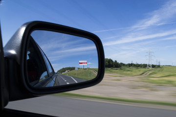 Fototapeta na wymiar View to the right of the car mirror 