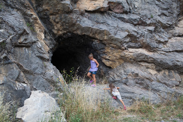 Children near a cave