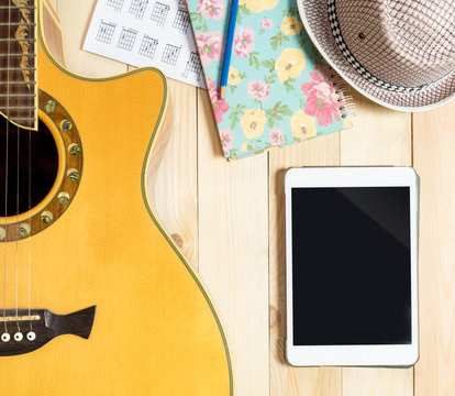 Blank Tablet with Guitar instrument for Music Contents - Powered by Adobe