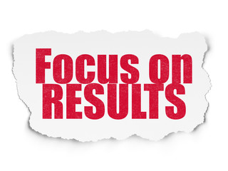 Business concept: Focus on RESULTS on Torn Paper background