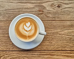 Foto op Plexiglas tree art cappuccino coffee on grunge wooden table © Dimitrios
