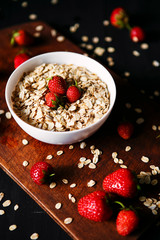 Healthy breakfast, muesli, granola with strawberries, health and