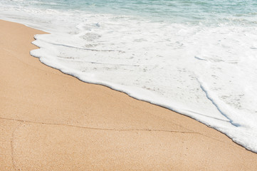 Sea water with sand beach