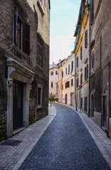 Fototapeta na wymiar Tivoli (Lazio), Italy - A visit in the historical and artistic town in province of Rome, Lazio region, central italy. In this picture: street of Tivoli 