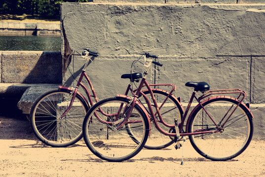 two bicycle parked on the waterfront