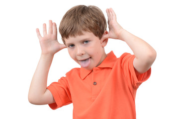 young boy making a face isolated white background
