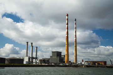 The Poolbeg chimneys viewed from a boat in Dublin bay, Dublin, Ireland
