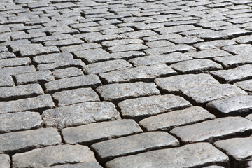 Stone paving texture. Abstract old pavement background.