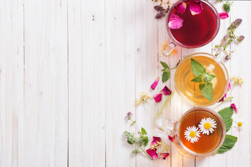 herbal tea on a white wooden background