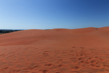 Fototapeta na wymiar Red sand dunes Mui Ne villiage, Vietnam