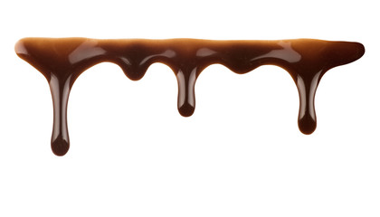 Melted chocolate dripping on white background
