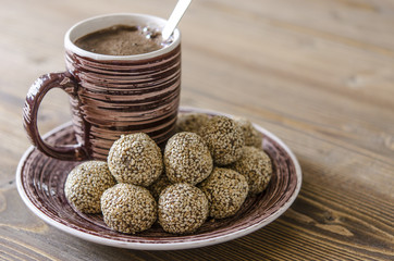 Truffles of chickpeas with chocolate and sesame seeds   