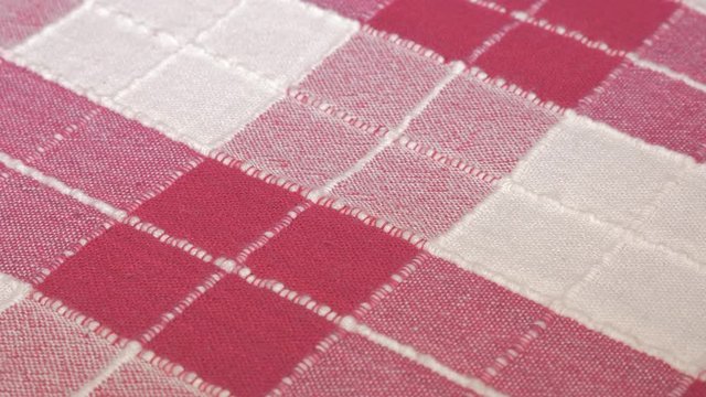 Checkered fabric pattern close-up 4K 3840X2160 UHD panning footage - Checkered red table cloth pattern 4K 2160p UHD video 