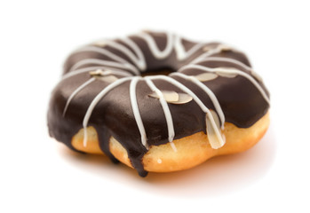 side view chocolate flavor donut on white background