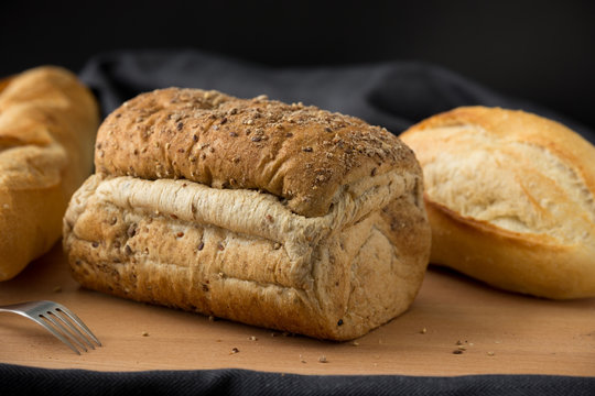 Whole wheat bread and French baguette