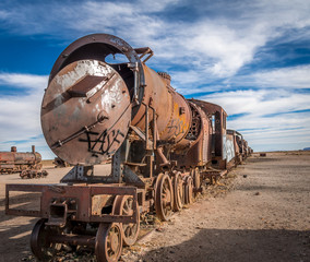 Fototapeta na wymiar Abandoned rusty old train in train cemetery, Bolivia