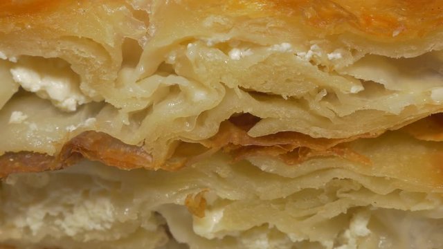 Fast food burek made in Serbia 4K 2160p UHD video - Burek breakfast meal in Serbia 4K 3840X2160 UHD footage