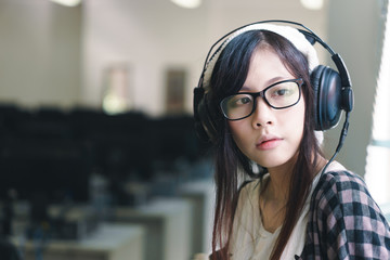 Asian girl with earphones