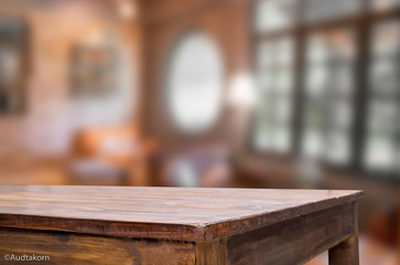 Fototapeta na wymiar Selected focus empty brown wooden table and Coffee shop blur bac
